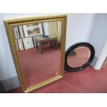 A Gilt Framed Rectangular Bevelled Wall Mirror, another earlier in oval. (2)