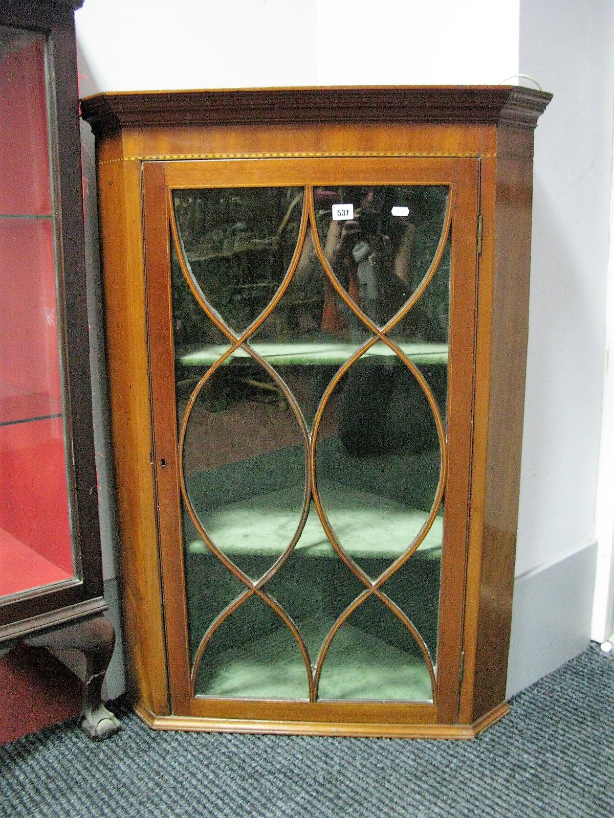 A XIX Century Mahogany Wall Corner Cabinet, with stepped pediment, inlay to astragal glazed door,