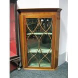 A XIX Century Mahogany Wall Corner Cabinet, with stepped pediment, inlay to astragal glazed door,