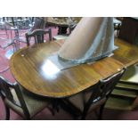 George III Style Mahogany Pedestal Table, with a crossbranded top, turned pedestal, swept and reeded