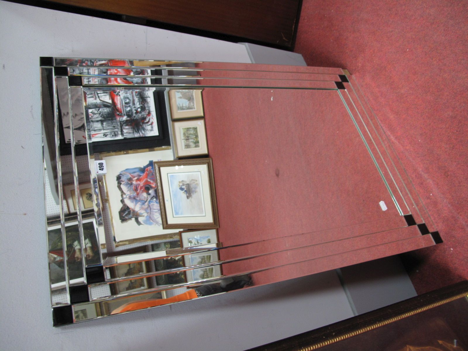 A Dunelm Rectangular Wall Mirror, with black square corners.