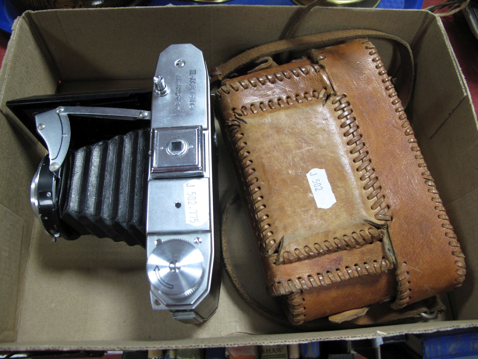 A Cased Kershaw Curlew II Folding Bellows Film Camera, 105 F4.5 Kershaw Critek lens.