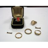 A Dress Ring, stamped "750", a 9ct gold band, cameo ring, eternity band, etc. (5)