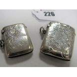 A Hallmarked Silver Vesta Case, all-over leaf scroll engraved, monogrammed, with suspension loop;