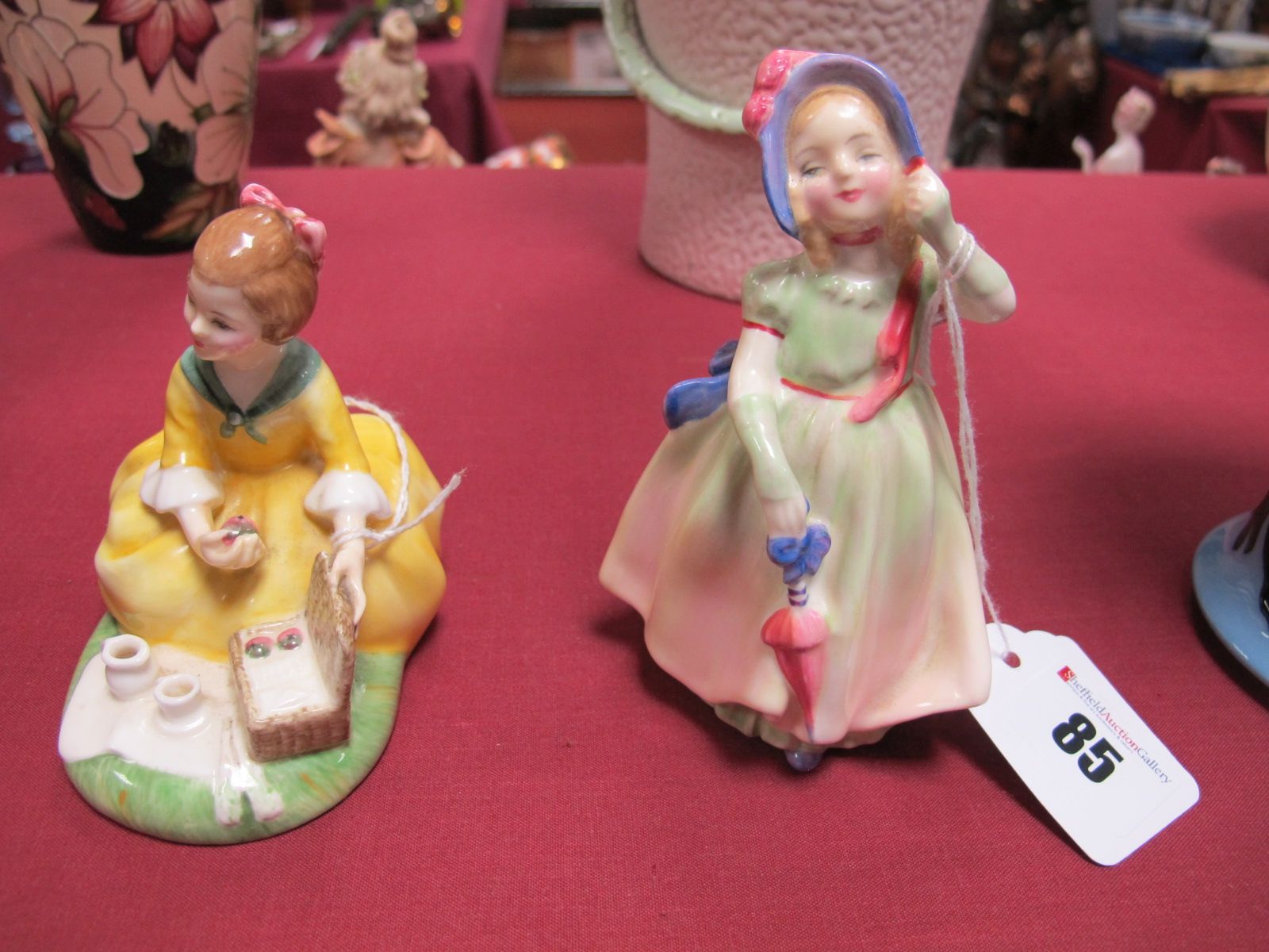 Two Royal Doulton Figurines 'Picnic' HN2308 and 'Babie' HN1679. (2)