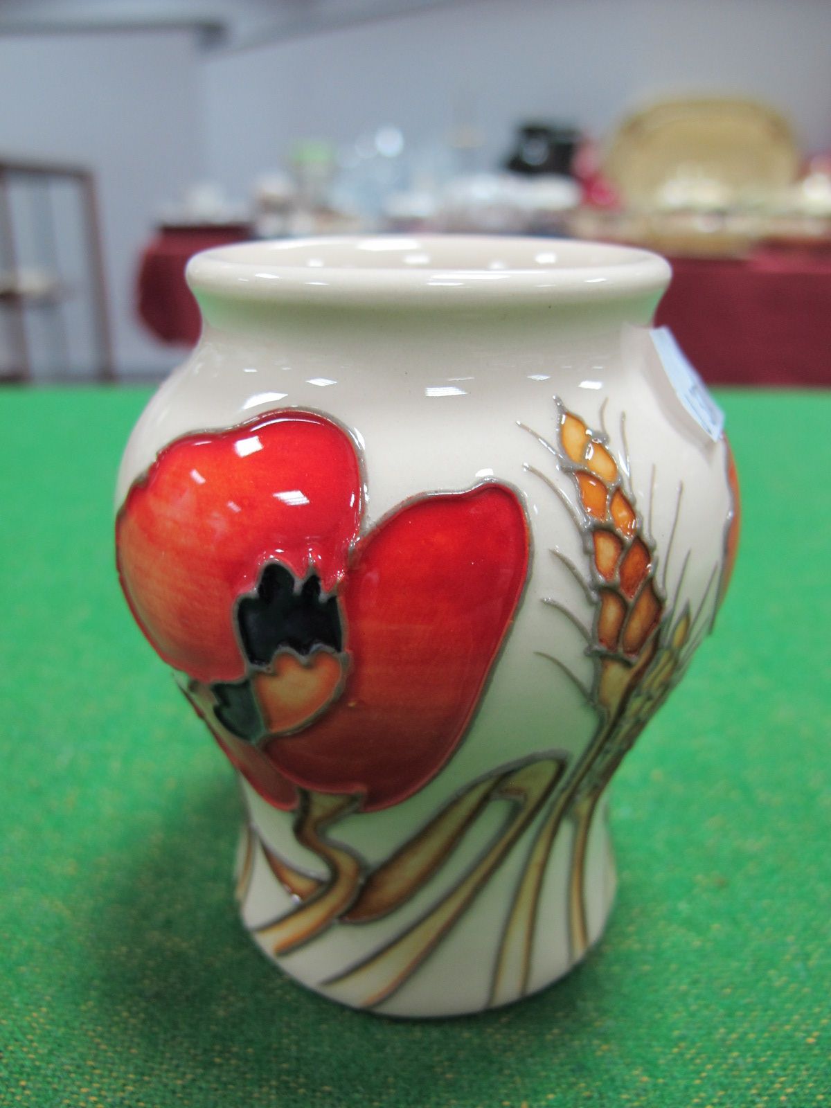 A Moorcroft Pottery "Harvest Poppy" Vase, designed by Emma Bossons, shape 146/3, impressed and