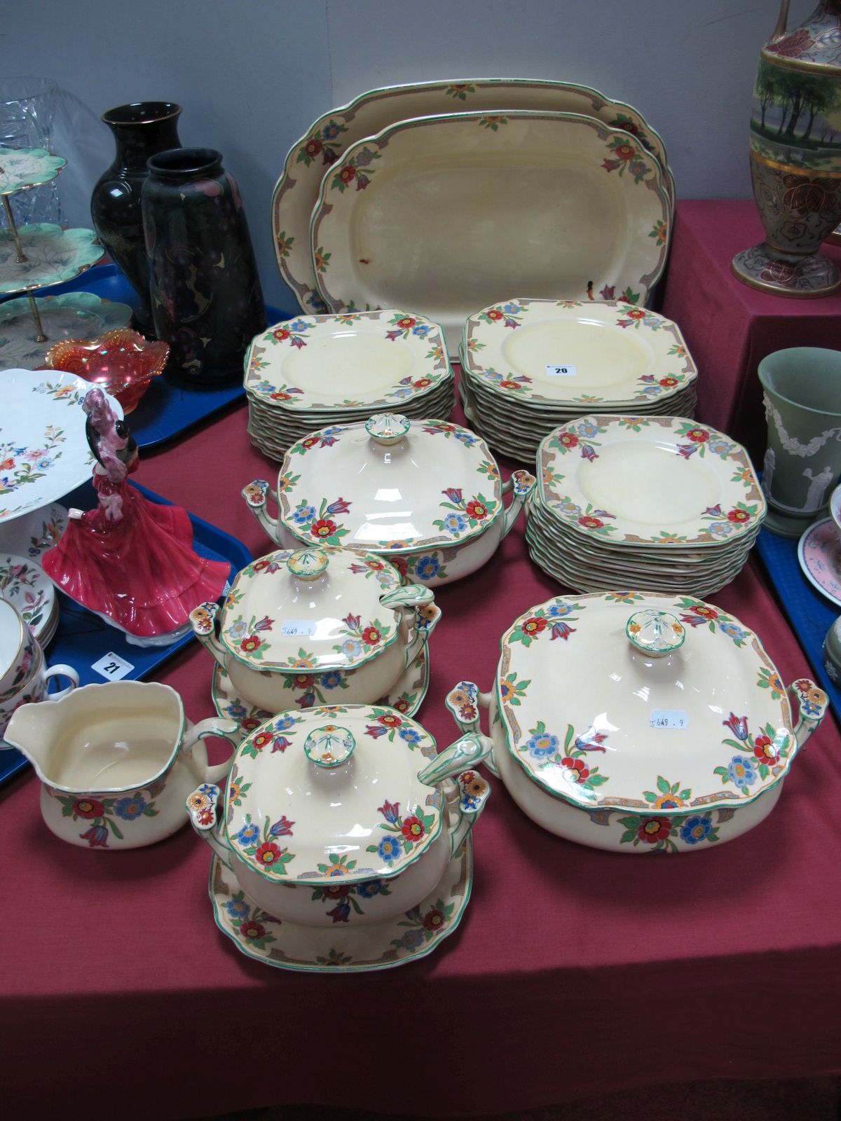 A Wedgwood Imperial Porcelain Dinner Service, decorated with an Art Deco style stylised floral