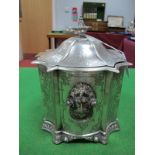A XIX Century Biscuit Barrel, of Gothic design allover detailed, with shaped hinged lid and mask and