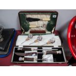 A Mappin & Webb Three Piece Carving Set, in original fitted case; a cased set of fish knives and