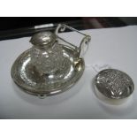 A Decorative Mounted Glass Inkwell, fitted on circular stand with pen rest, overall on four ball