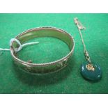A 9ct Metal Core Bangle, hinged to snap clasp; modern pendant on chain.