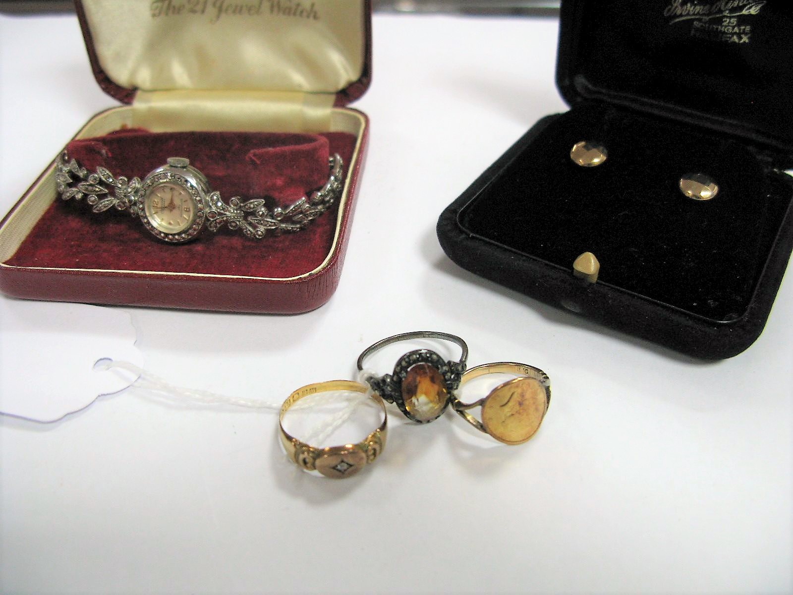 A Marcasite Set Ladies Wristwatch, stud earrings, dress ring, single stone ring and an American coin