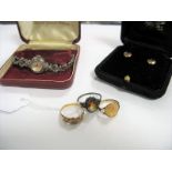 A Marcasite Set Ladies Wristwatch, stud earrings, dress ring, single stone ring and an American coin