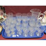 A Part Suite of of Early XX Century Acid Etched Glassware, including jug, six tumblers, twelve