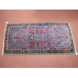 A Mid XX Century Persian Style Silk Rug, all over decoration of flowers and foliage on a purple