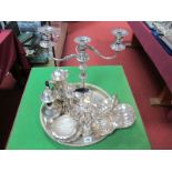 A Matching Chocolate and Hot Water Pot, a twin branch candelabrum, offering dish, shell butter