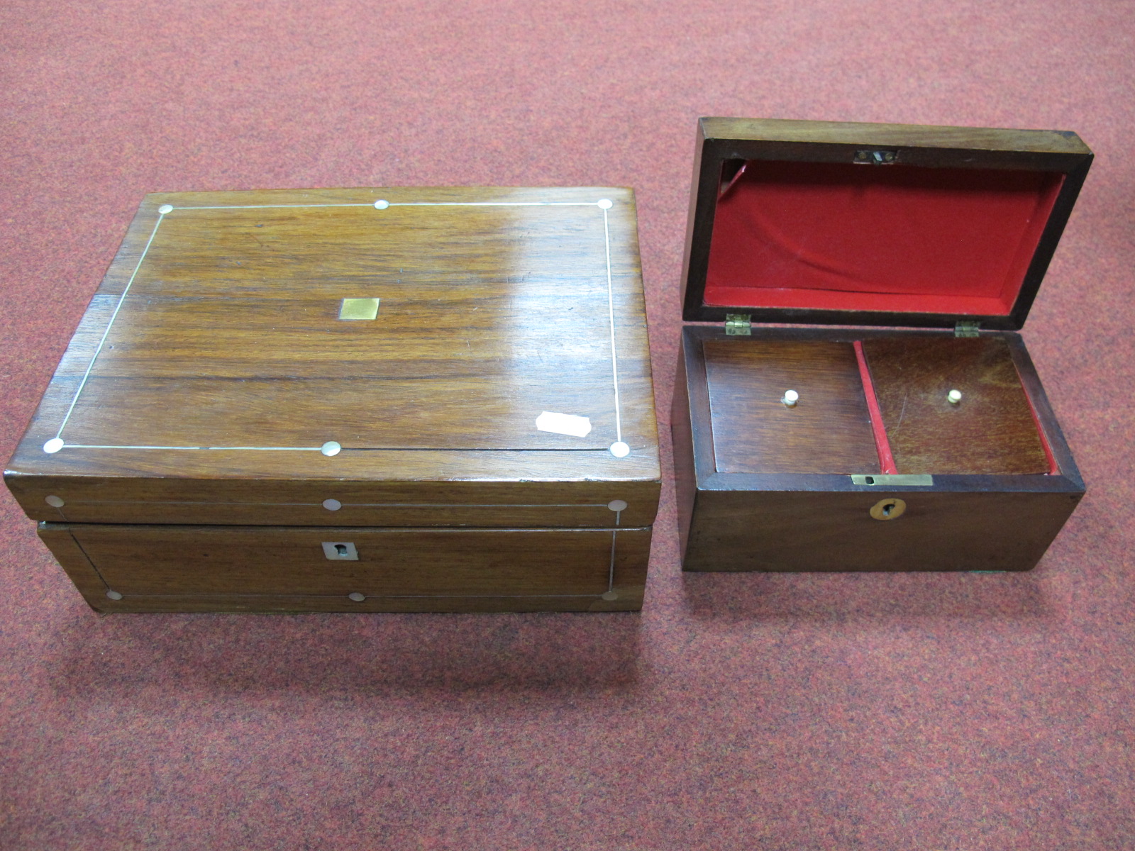 A Victorian Rosewood Jewellery Box, with mother of pearl stringing and blank brass cartouche and