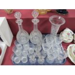 A Pair of Lead Crystal Decanters, slice cut necks on star patterned bases, a flared vase, set of six