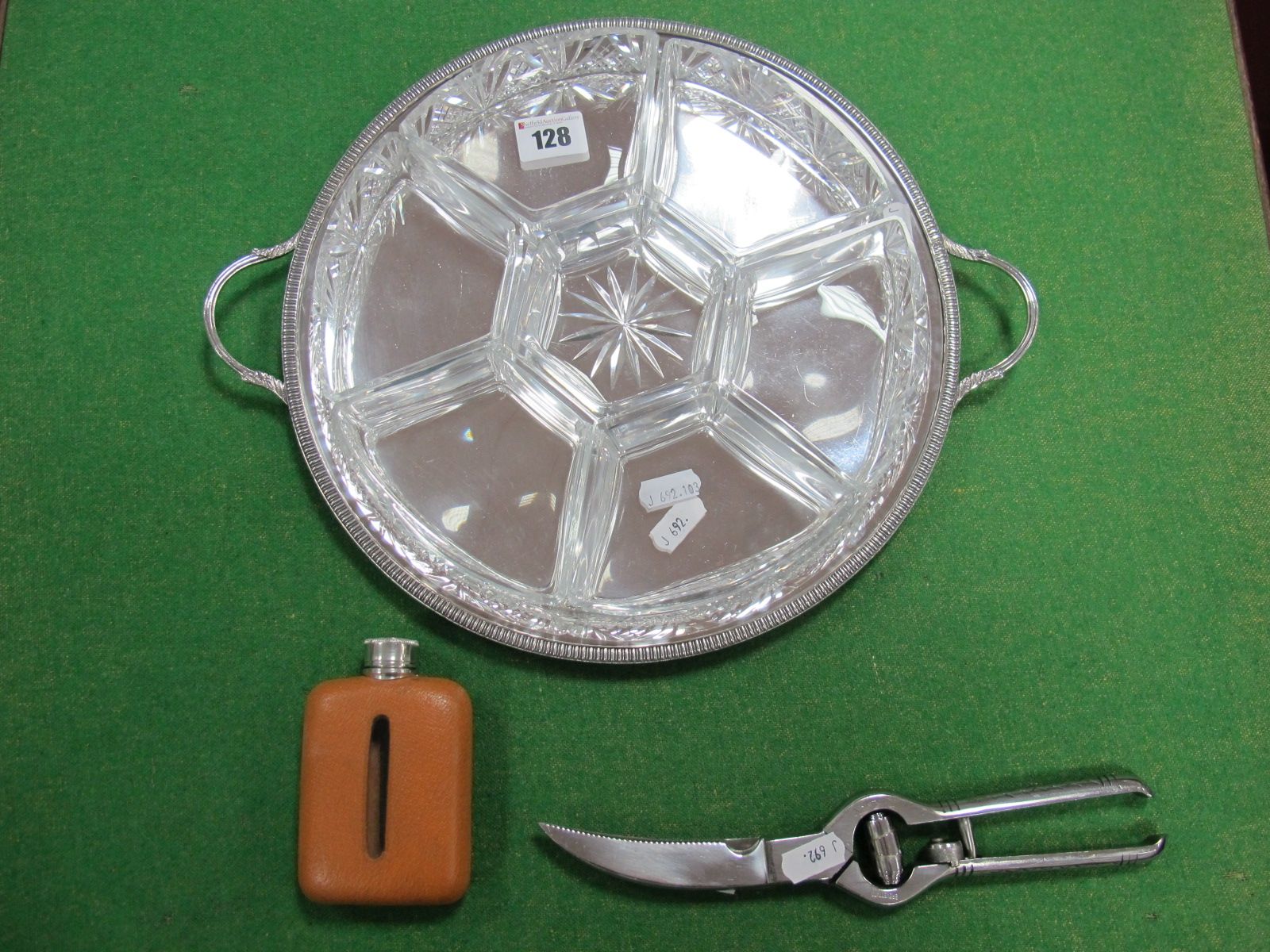 Hors D'oeuvres Dishes on Plated Tray, a pair of game shears and a small leather covered hipflask. (