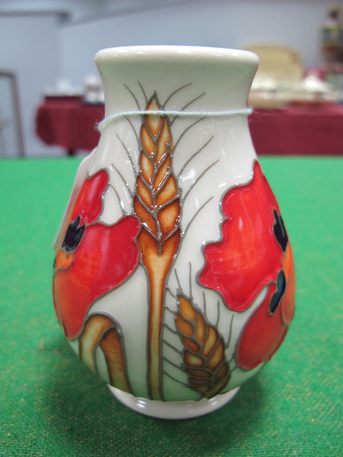 A Moorcroft Pottery "Harvest Poppy" Vase, designed by Emma Bossons, shape 7/3, impressed and painted