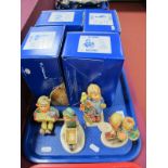 Four Boxed Hummel Figures, including 'Lets Sing, Little Landscaper, Congratulation and Going to