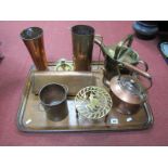 A Copper Kettle, brass trivet, copper jug, tapering cylindrical vase, hot water bottle, brass