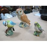 A Beswick 'Barn Owl' 2026, Beswick 'Blue Tit' 992 and a Beswick 'Goldcrest' 2415. (3)