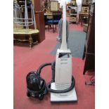 A Panasonic Vacuum Clean, another Rowenta 1300w Revo vacuum. (2)