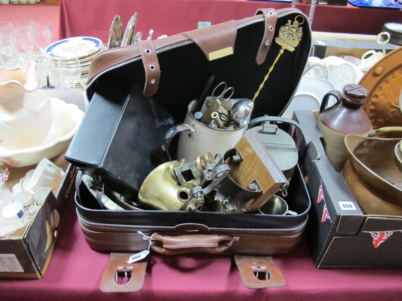 A Brass Bell, copper watering cans, enamelled jug, Tasco binoculars, etc, in case.