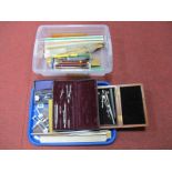 A Geometry Instruments in Fitted Morocco Case, further geometry sets, slide rule, etc:- One Tray