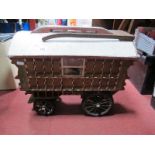 A Large Scale Wooden Built Model of a Horse Drawn Gypsy Caravan, no horse, length 44cm.
