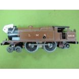 A Pre War Hornby #2 'O' Gauge Clockwork 4-4-2 Tank Engine #6954, faded L.M.S livery.