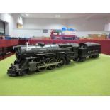 A Lionel Lines 'O' Gauge Diecast Electric Steam Locomotive and Tender 2-6-2 #2025, playworn and