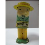 A Mid XX Century Tinlate Money Box by Apex of America, a spring loaded action in the form of a