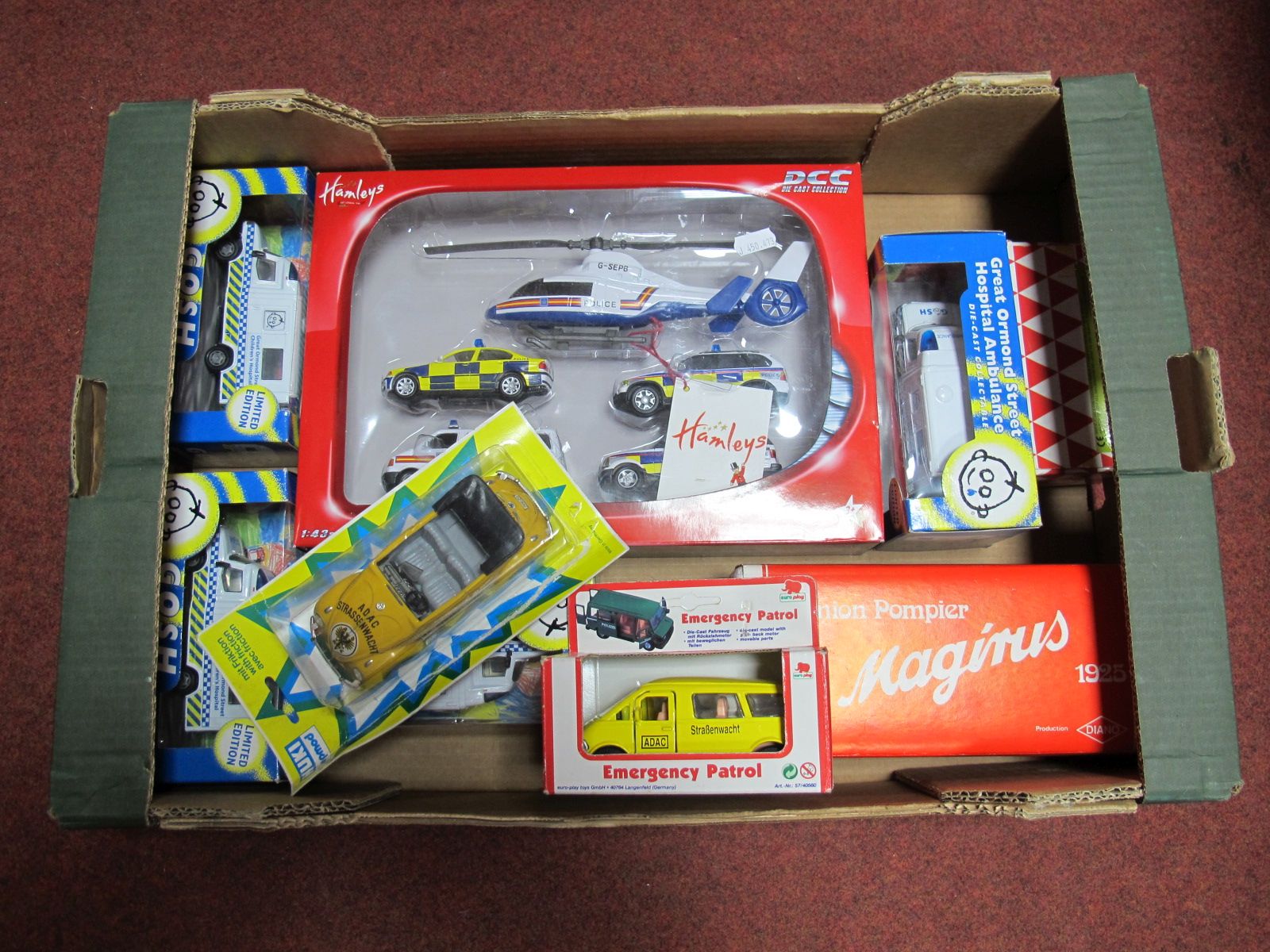 Thirteen Boxed Diecast Emergency Services Vehicles and Helicopter by Richmond Toys, Diano, Hamleys