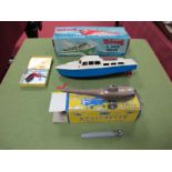 A Boxed Tri-ang 11 Clockwork Cabin Cruiser, with key and dinghy, together with a boxed Mettoy