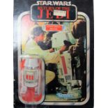 An Original Star Wars Return of The Jedi Carded R5-D4 Droid, by Kenner 1983 on 65 back card,