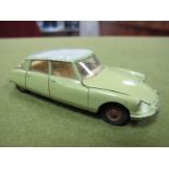 A French Dinky #530 Citroen D519, lime green body, grey roof, ivory interior, spun hubs, playworn.