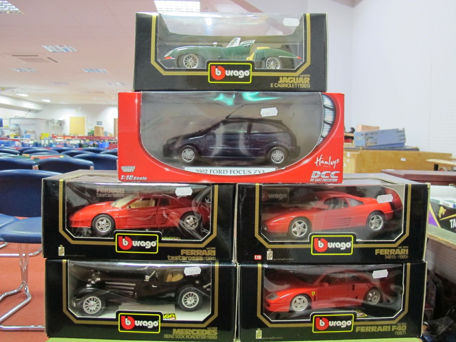 Five Boxed Burago 1:18th and 1:20th Scale Diecast Sports Cars, including #3039 Ferrari 348TO (1989),