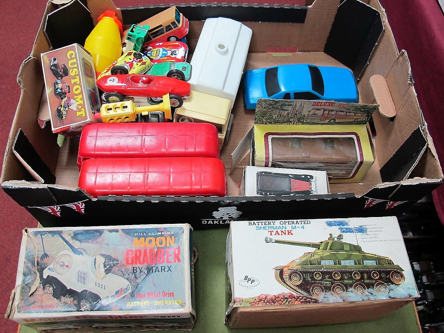 Twenty-Two Plastic and Tinplate Vehicles by Marx, BPP, Tiger Toy, Tonka, etc, including a boxed