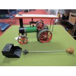 A Mamod Live Steam TE1A Traction Engine, model has been steamed, with scuttle and in correct