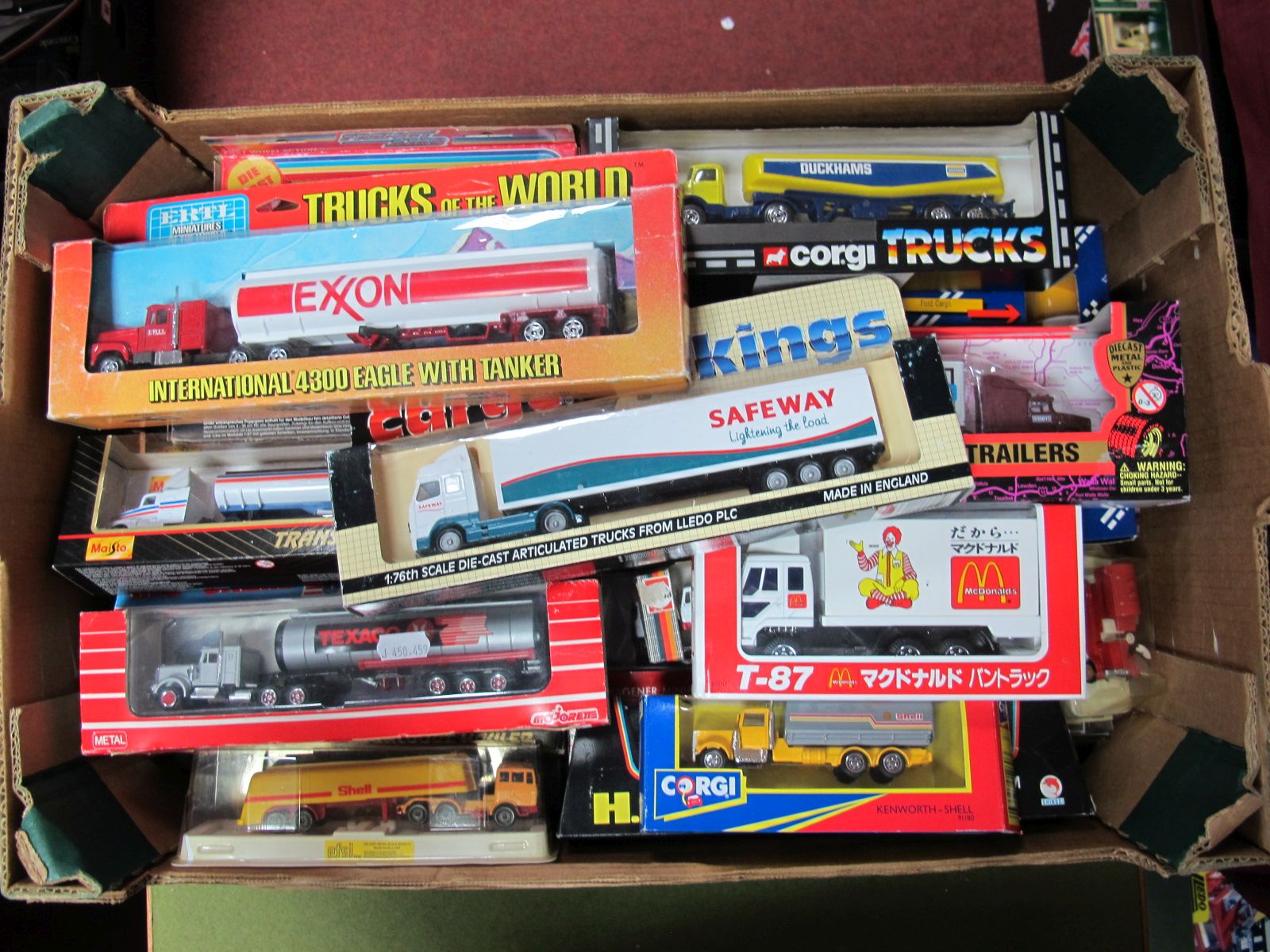 Twenty-Nine Boxed Diecast Commercial Vehicles by Maisto, Majorette, Corgi, EFSI, ERTL, Herpa, etc,