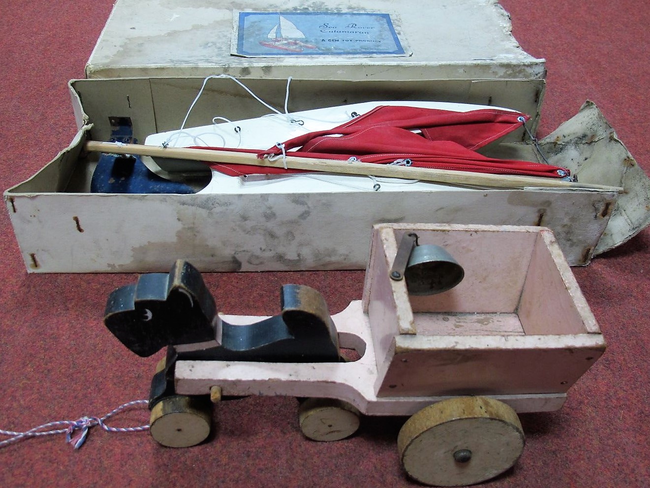 A boxed Gen Toy Fibreglass and Wooden Constructed 'Sea Rover' Catamaran, with steel keel and box.