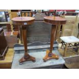A Pair of XIX Century Style Mahogany Jardiniere Stands, with circular cross banded tops, tapering