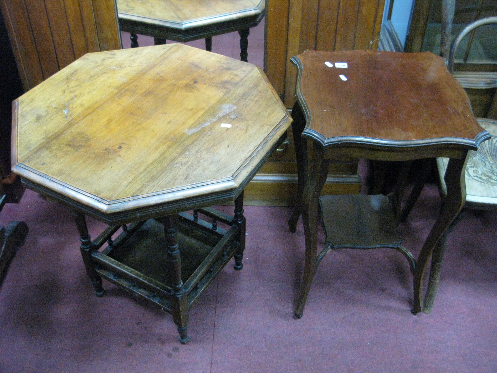 An Early XX Century Walnut Centre Table, with octagonal shaped top, moulded edge, turned legs,