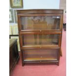 A XX Century Mahogany Three Height Sectional Bookcase, with glazed front, on square legs.
