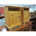 A Pair of Pine Bedside Cupboards, with low backs, panelled cupboard doors, bracket feet. (2)