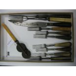 Seven c. XVIII-XIX Century Three Pronged Forks, a meat fork, knife sharpener, fork server, etc.