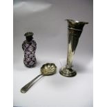 A Decorative Hallmarked Silver Spoon, together with a purple and clear glass scent bottle and a