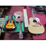 Three Acoustic Guitars, and music stand.